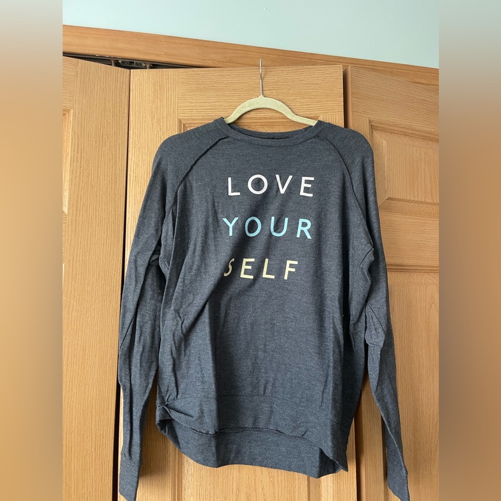 Three graphic crewneck sweatshirts